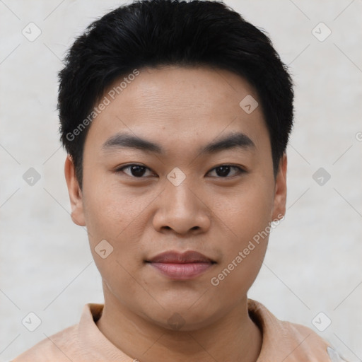 Joyful asian young-adult male with short  black hair and brown eyes