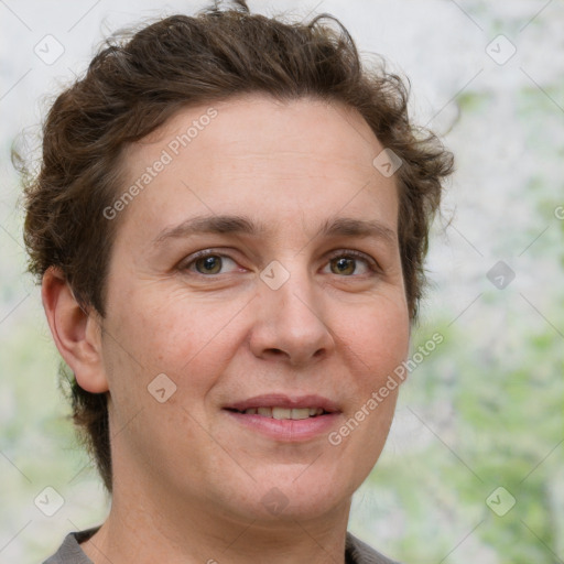 Joyful white adult female with short  brown hair and grey eyes