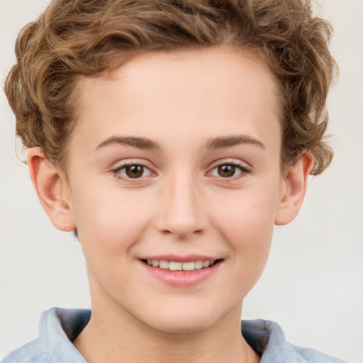 Joyful white child female with short  brown hair and brown eyes