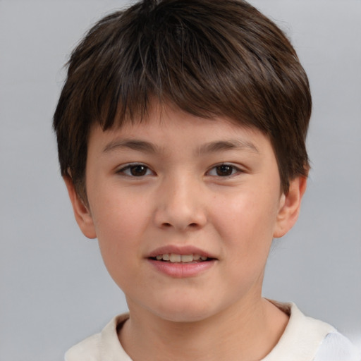 Joyful white child female with short  brown hair and brown eyes