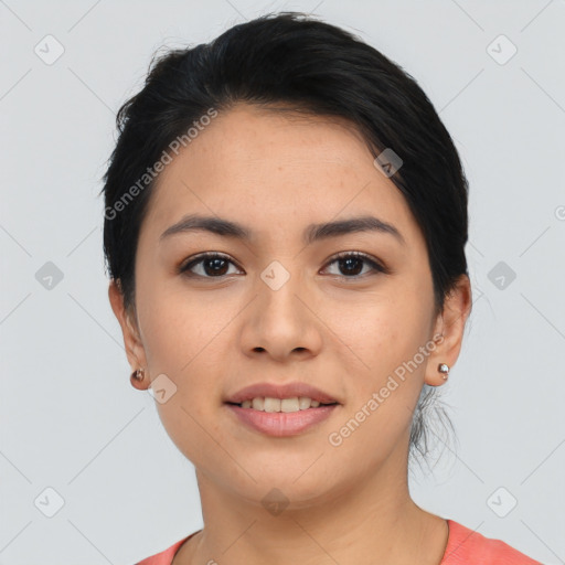 Joyful asian young-adult female with short  black hair and brown eyes