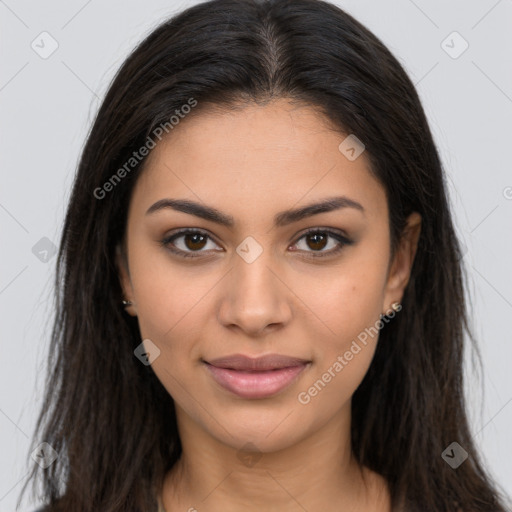 Joyful latino young-adult female with long  brown hair and brown eyes