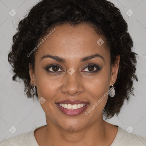 Joyful black young-adult female with medium  brown hair and brown eyes