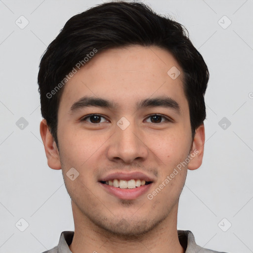 Joyful asian young-adult male with short  black hair and brown eyes