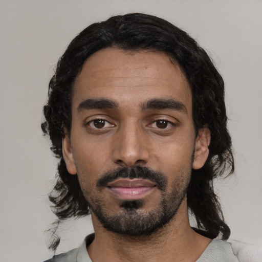 Neutral black young-adult male with medium  black hair and brown eyes