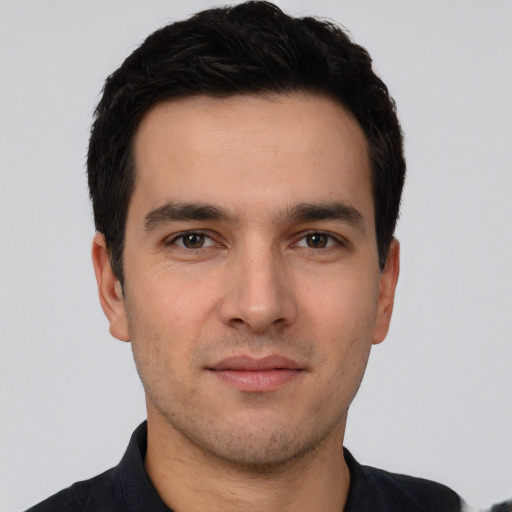 Neutral white young-adult male with short  black hair and brown eyes