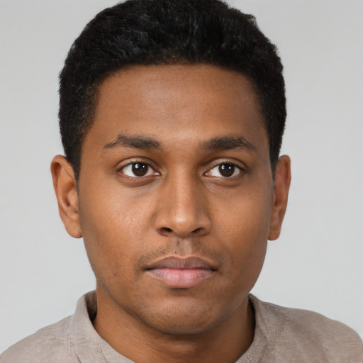 Neutral black young-adult male with short  brown hair and brown eyes