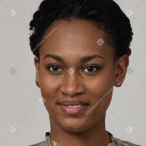 Joyful black young-adult female with short  black hair and brown eyes