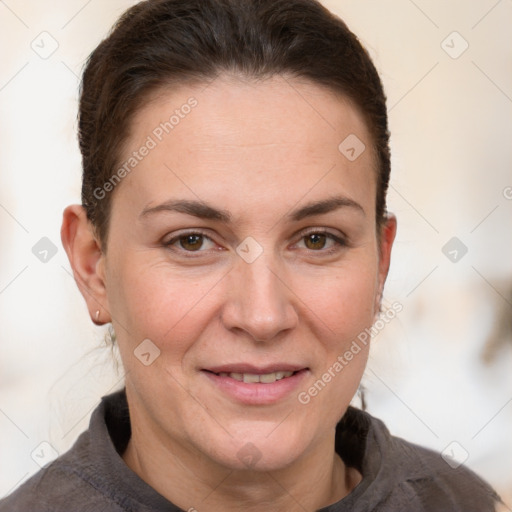 Joyful white adult female with short  brown hair and brown eyes