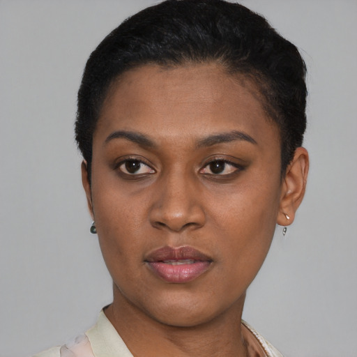 Neutral latino young-adult female with short  black hair and brown eyes