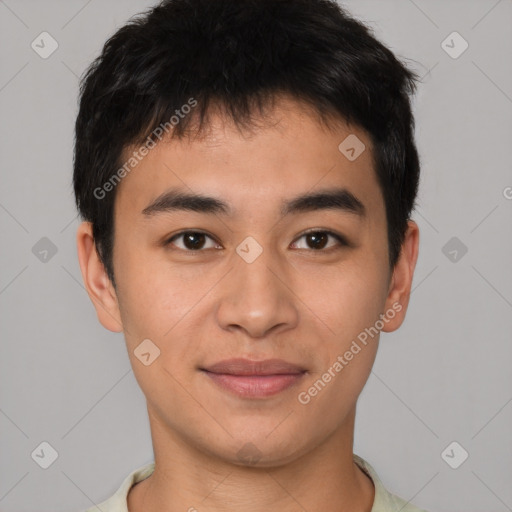 Joyful asian young-adult male with short  brown hair and brown eyes