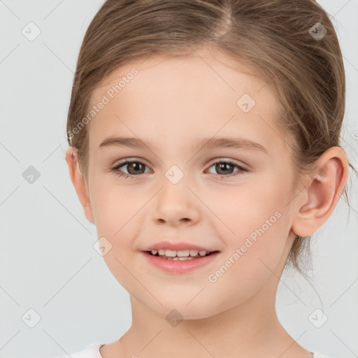 Joyful white child female with medium  brown hair and brown eyes