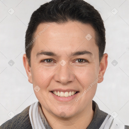 Joyful white young-adult male with short  brown hair and brown eyes