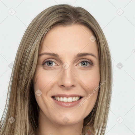 Joyful white young-adult female with long  brown hair and green eyes