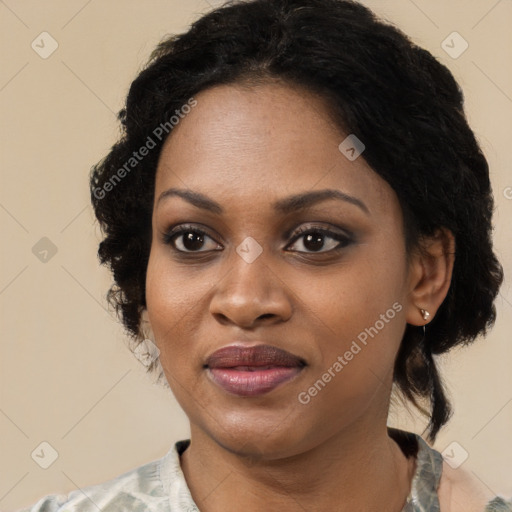 Joyful black young-adult female with medium  black hair and brown eyes