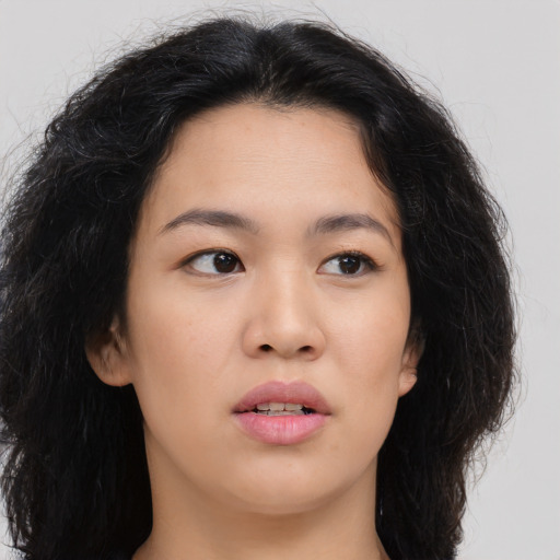 Neutral asian young-adult female with long  brown hair and brown eyes