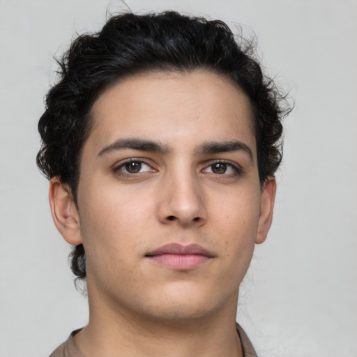 Neutral latino young-adult male with short  brown hair and brown eyes