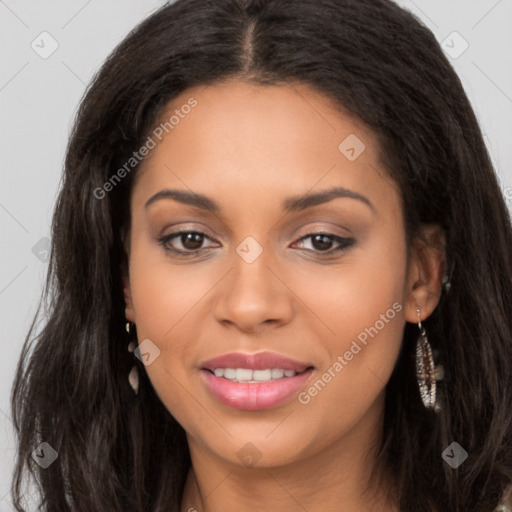 Joyful latino young-adult female with long  brown hair and brown eyes