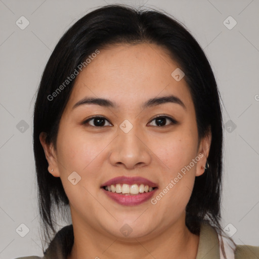 Joyful latino young-adult female with medium  black hair and brown eyes