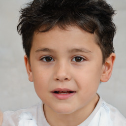 Joyful white child male with short  brown hair and brown eyes