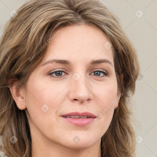 Joyful white young-adult female with medium  brown hair and green eyes