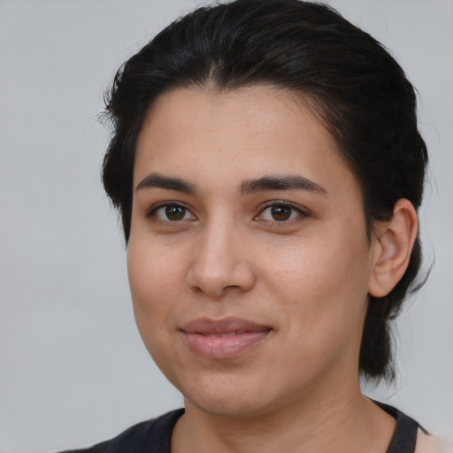 Joyful asian young-adult female with medium  brown hair and brown eyes