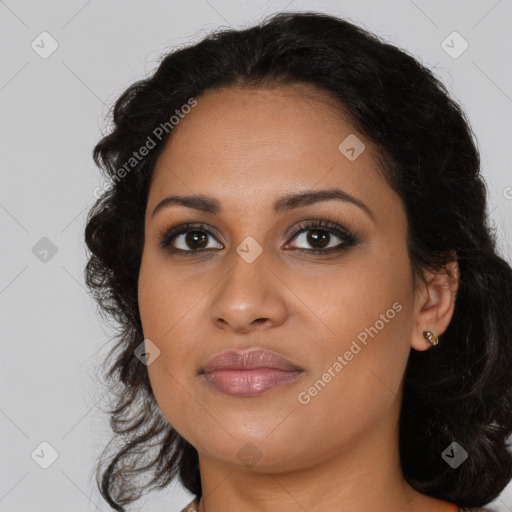 Joyful latino young-adult female with long  black hair and brown eyes