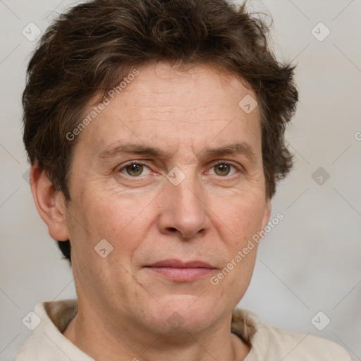 Joyful white adult male with short  brown hair and grey eyes