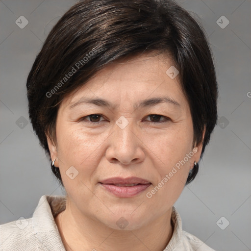 Joyful white adult female with medium  brown hair and brown eyes