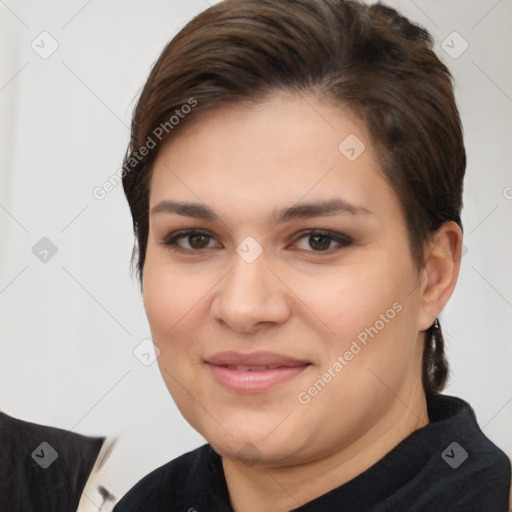 Joyful white young-adult female with short  brown hair and brown eyes