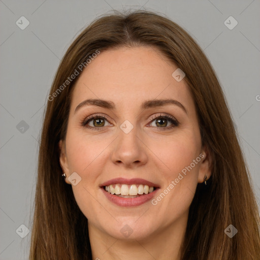 Joyful white young-adult female with long  brown hair and green eyes