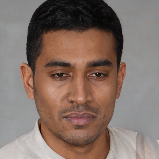 Neutral latino young-adult male with short  black hair and brown eyes