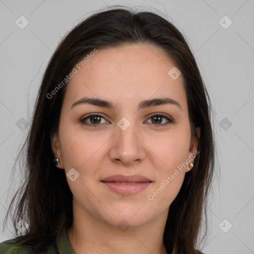 Joyful white young-adult female with long  brown hair and brown eyes