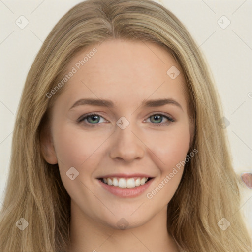 Joyful white young-adult female with long  brown hair and green eyes