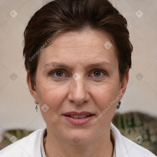 Joyful white adult female with short  brown hair and brown eyes