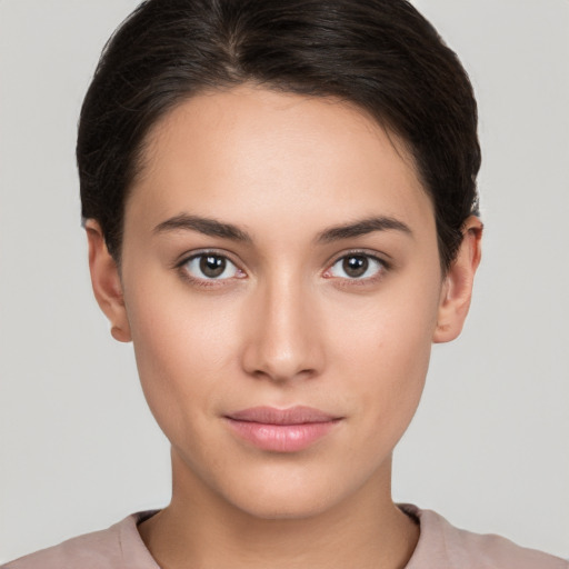 Neutral white young-adult female with short  brown hair and brown eyes