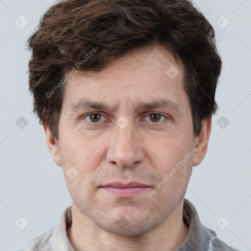 Neutral white adult male with short  brown hair and brown eyes