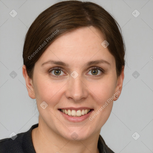 Joyful white young-adult female with medium  brown hair and grey eyes