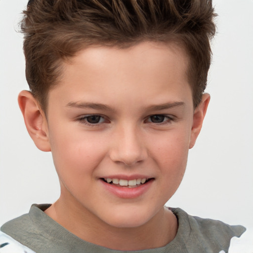 Joyful white child male with short  brown hair and brown eyes