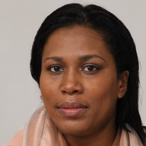 Neutral black young-adult female with medium  black hair and brown eyes