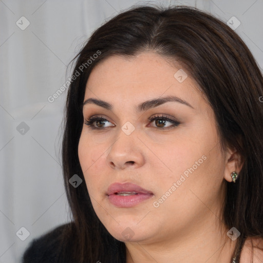 Neutral white young-adult female with long  brown hair and brown eyes