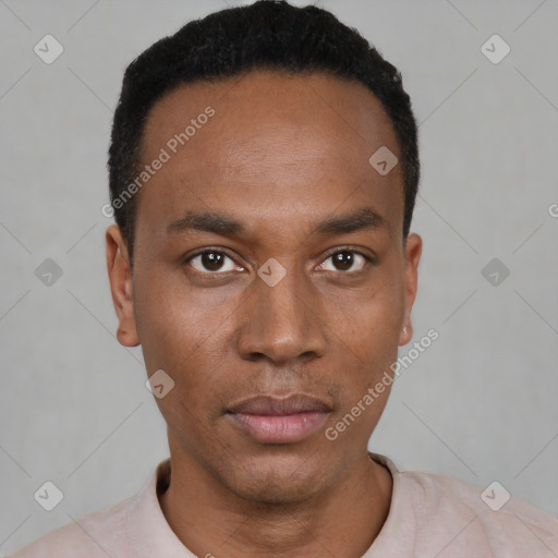 Neutral black young-adult male with short  black hair and brown eyes