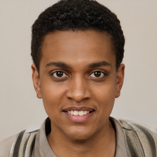 Joyful black young-adult male with short  black hair and brown eyes