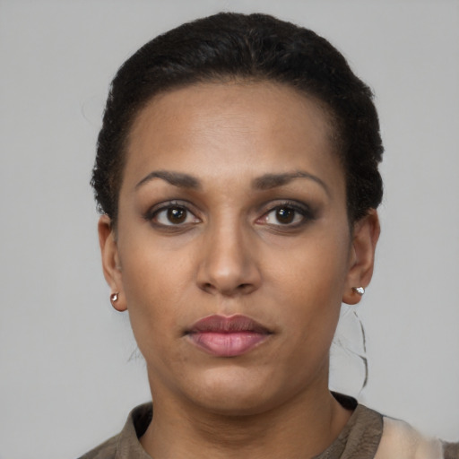 Neutral black young-adult female with short  black hair and brown eyes