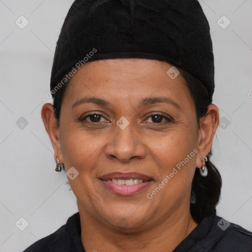 Joyful white adult female with short  brown hair and brown eyes