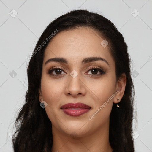 Joyful latino young-adult female with long  brown hair and brown eyes