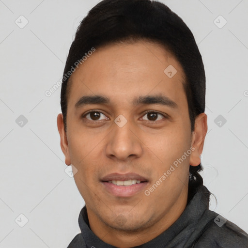 Neutral latino young-adult male with short  black hair and brown eyes