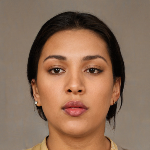 Neutral asian young-adult female with medium  brown hair and brown eyes