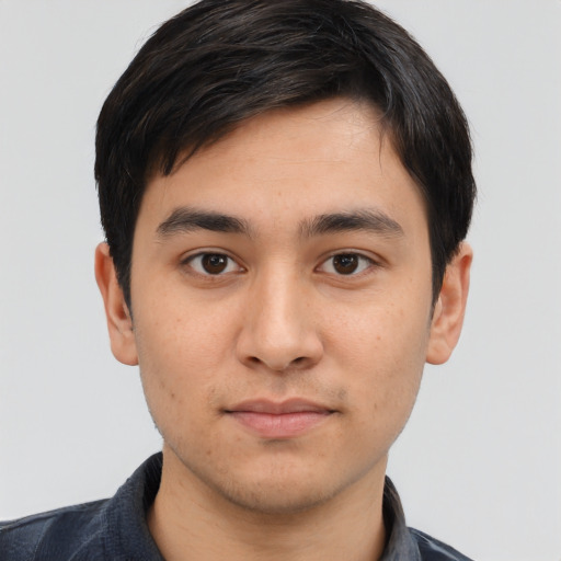 Neutral white young-adult male with short  black hair and brown eyes