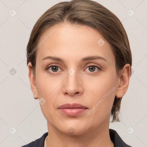 Neutral white young-adult female with medium  brown hair and brown eyes